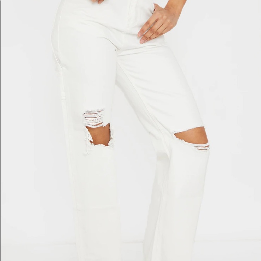 White Cargo Distressed Baggy Jeans
 
Size: 0
 
Colour: White
